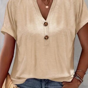 Camisa de manga corta con botones de color liso.