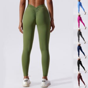 Pantalones de yoga ajustados y transpirables de secado rápido para mujer, mallas de realce de cadera en color melocotón.